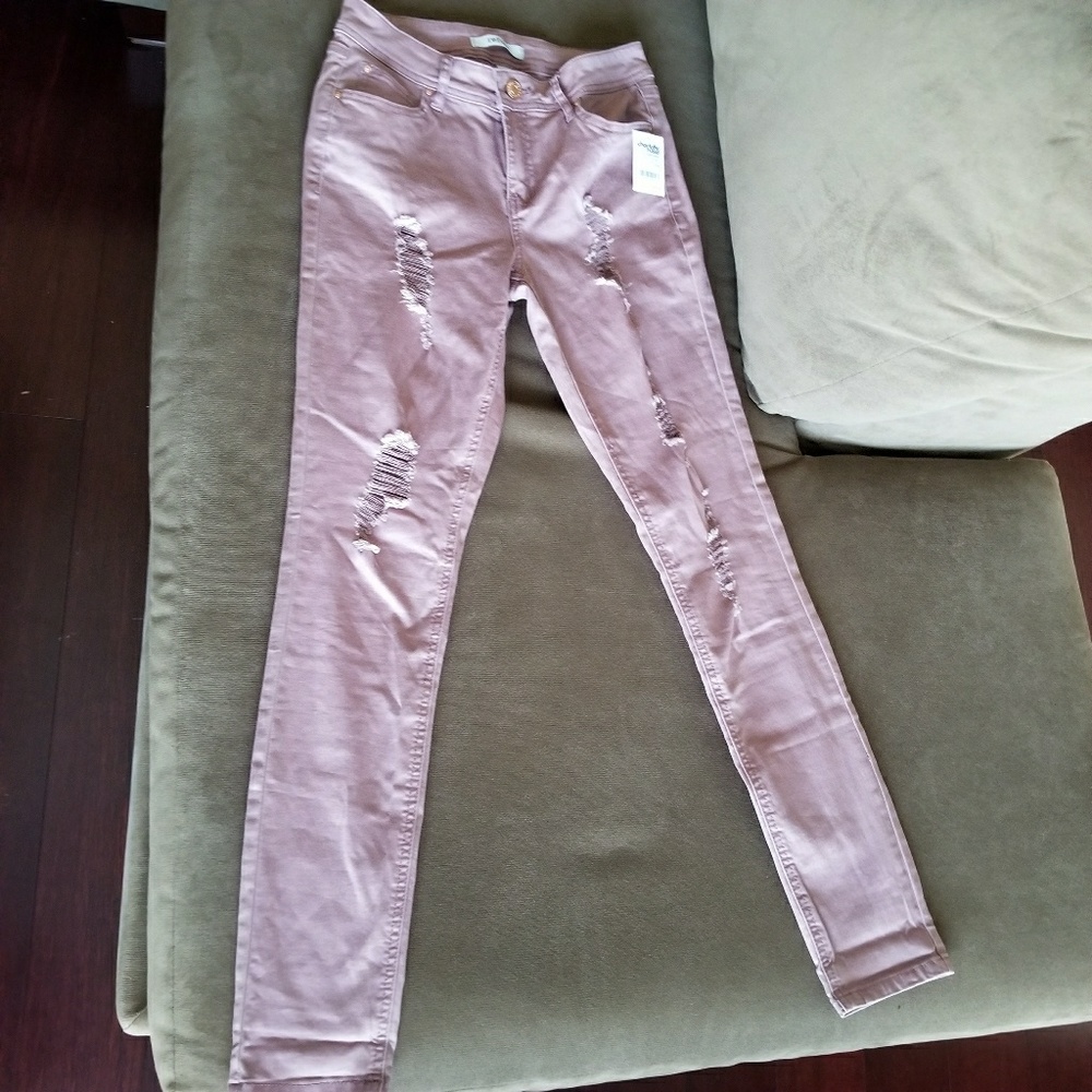 Dusty pink/purple ripped jeans
